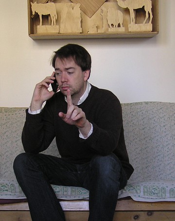 Who is that fellow with the first generation iPhone?