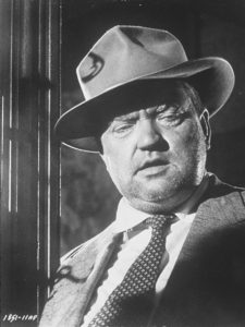Orson Welles in the role of Hank Quinlan