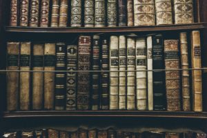 Stock images of old books on a shelf