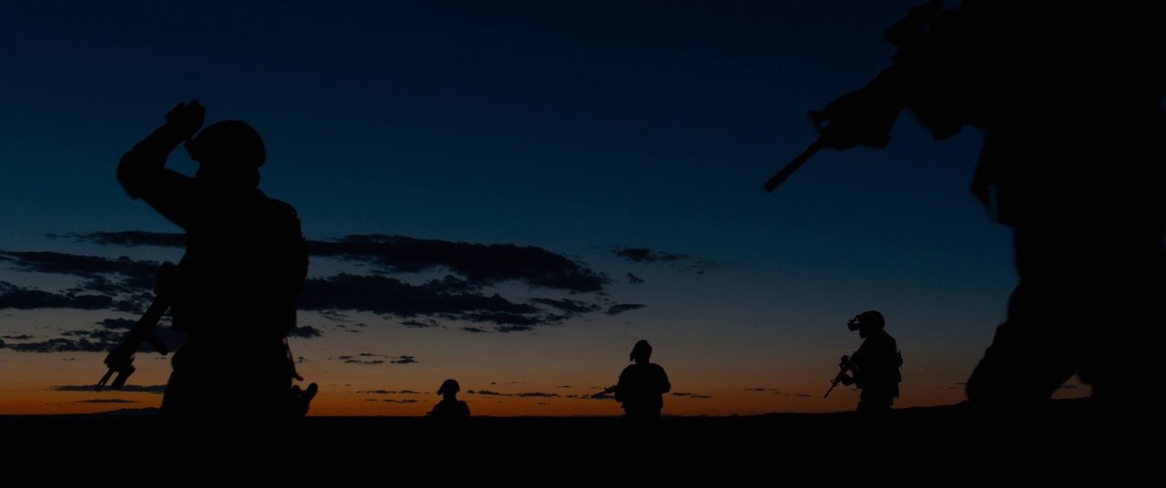 Still showing a CIA task force about to invade a drug tunnel, from the 2015 Denis Villeneuve film Sicario, starring Emily Blunt, Daniel Kaluuya, Benicio Del Toro, and Josh Brolin.