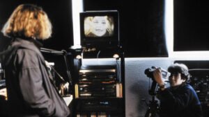 Still from the 1992 Michael Haneke film Benny's Video, in which Benny and a girl are in his room