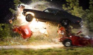 Still from the 2007 Tarantino film "Death Proof" starring Kurt Russell, Rose McGowan, Vanessa Ferlito, Tracie Thoms, Zoe Bell, and Rosario Dawson